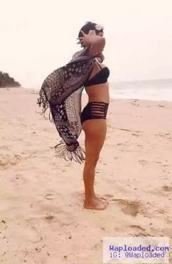 Former beauty queen Anita Uwagbale-Iseghohi shows off her sexy bikini body at the beach with family